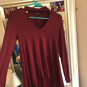 Maroon long sleeve top with cut out